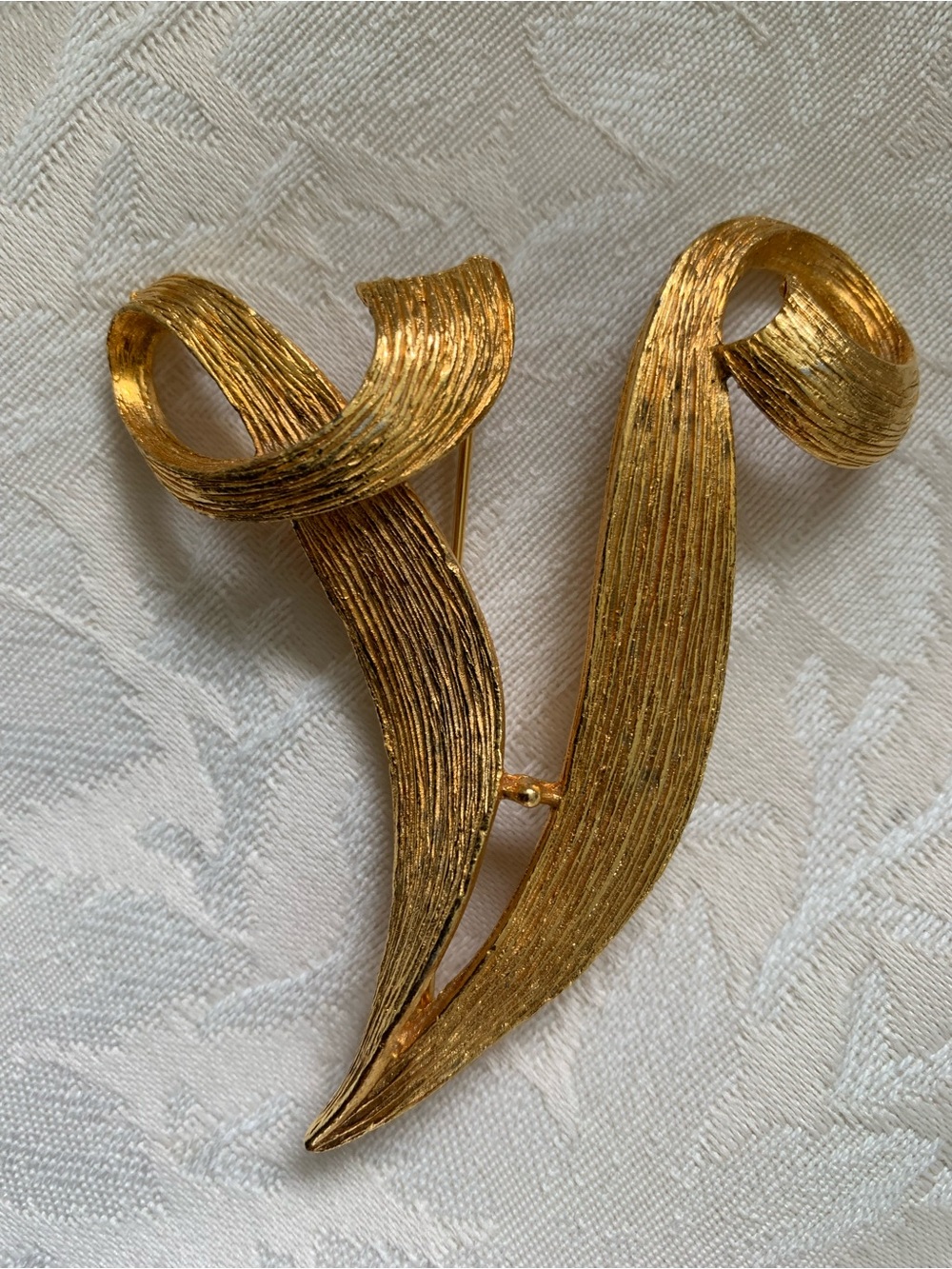 Stunning Gold-Tone “V” Brooch